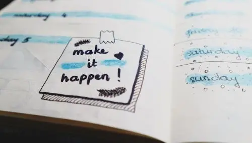 Diary with a note saying make it happen